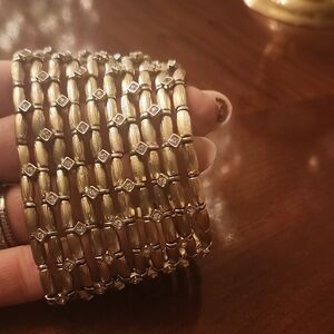 Elegant Gold Bracelet with Silver Accents